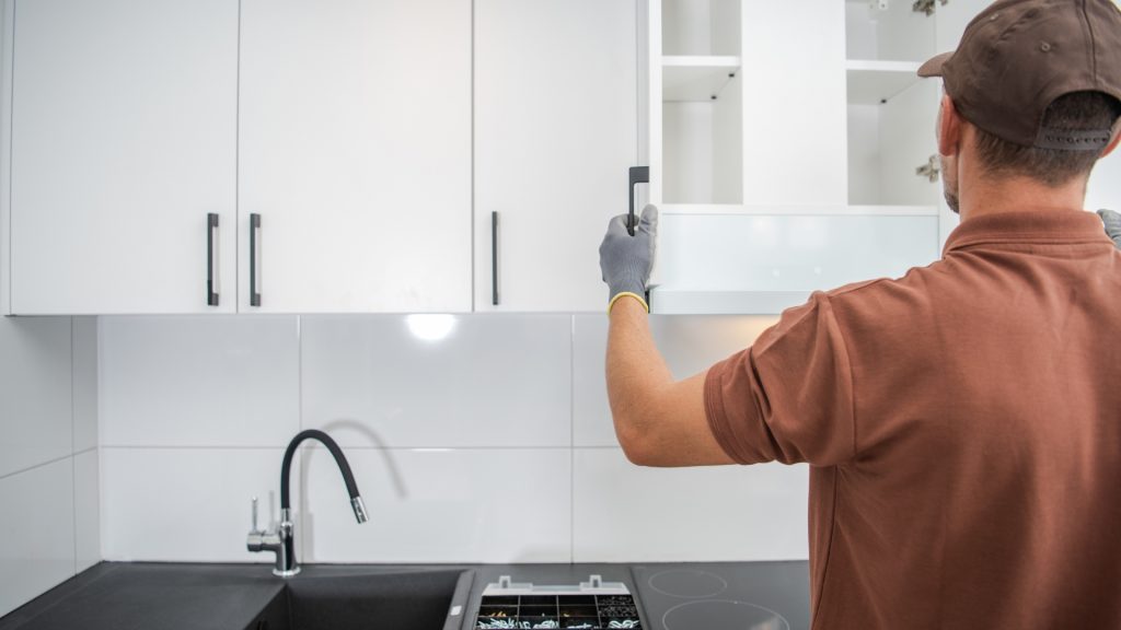 Cupboard Installation man